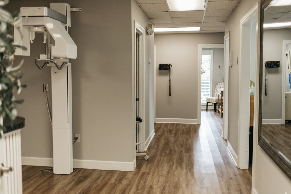 Hallway at Cross County Dentistry featuring a panoramic dental x-ray machine in North Charleston, SC
